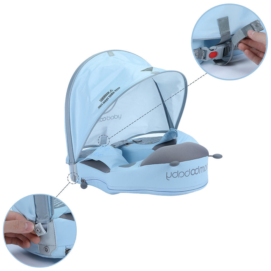 Peuter zwemt met vrije armen in het Mambobaby Lieveheersbeestje schouder zwemvest